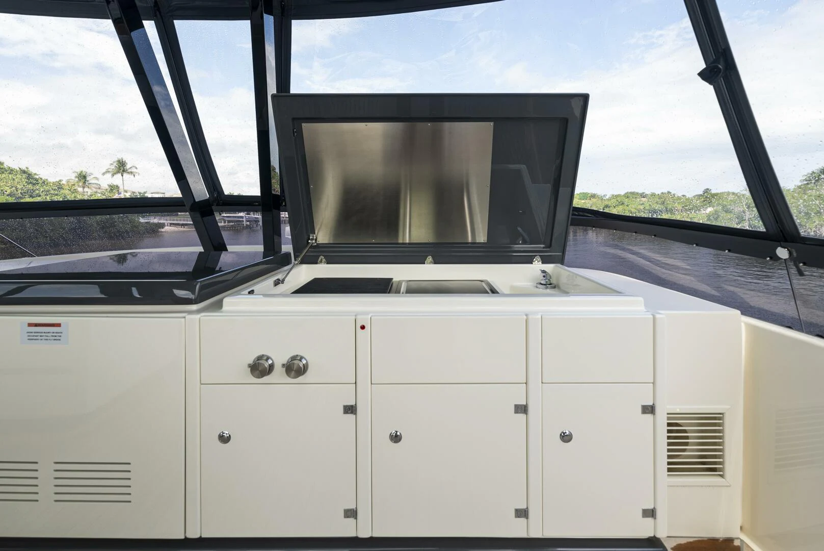 a white microwave oven on a trailer aboard PINCH ME Yacht for Sale