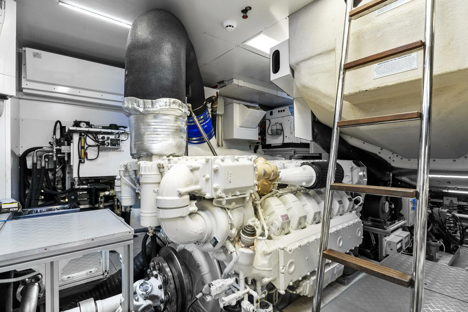 a large machine in a room aboard PINCH ME Yacht for Sale
