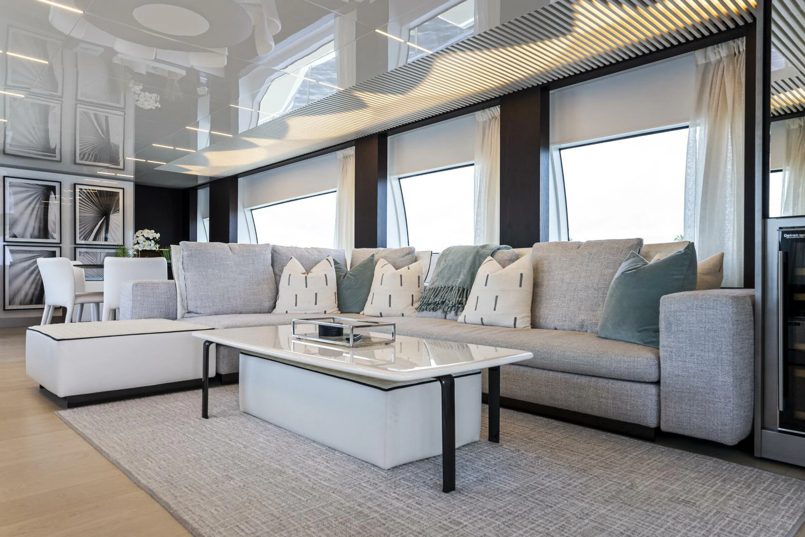 a living room with a large window aboard PINCH ME Yacht for Sale