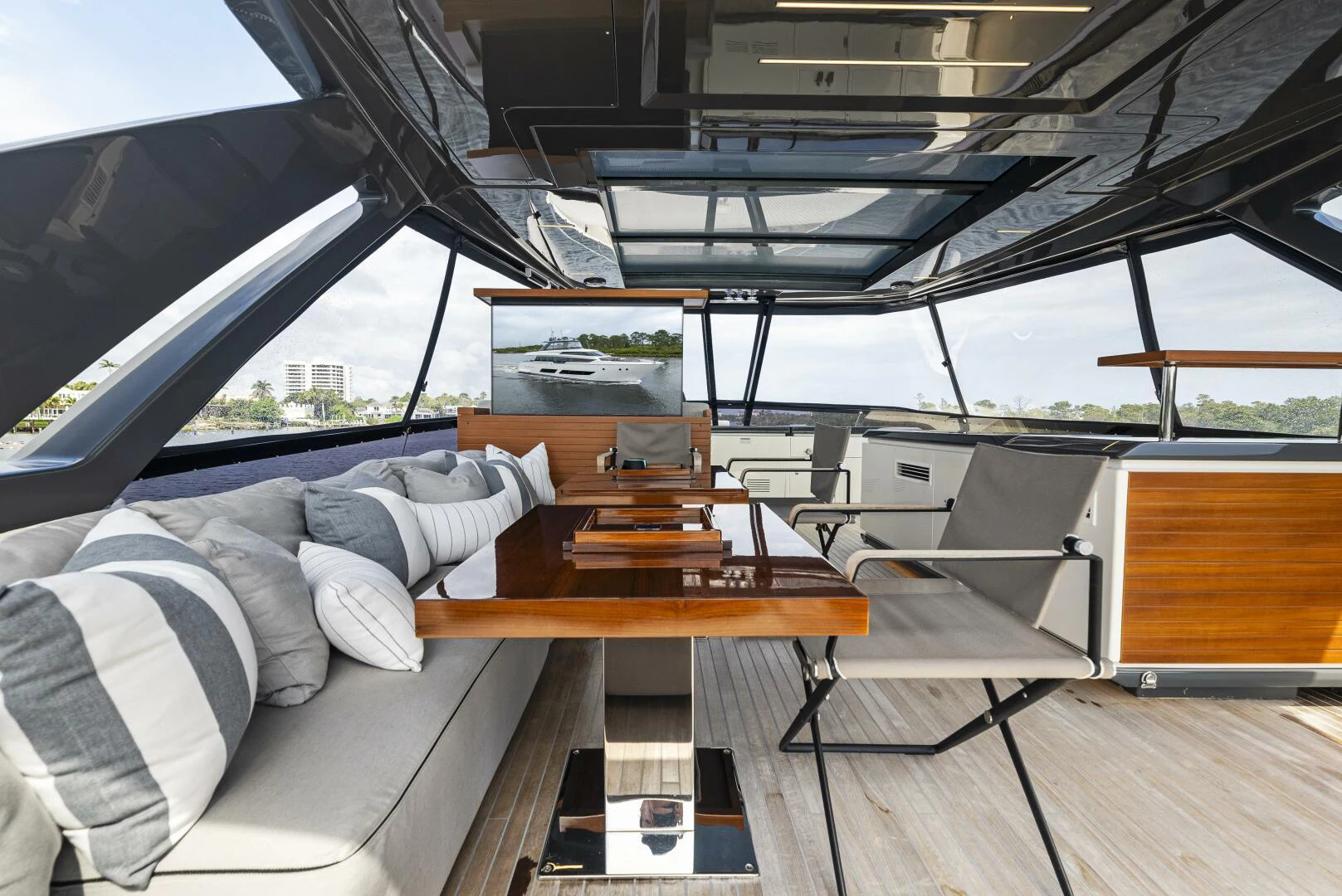 a boat with a table and chairs aboard PINCH ME Yacht for Sale