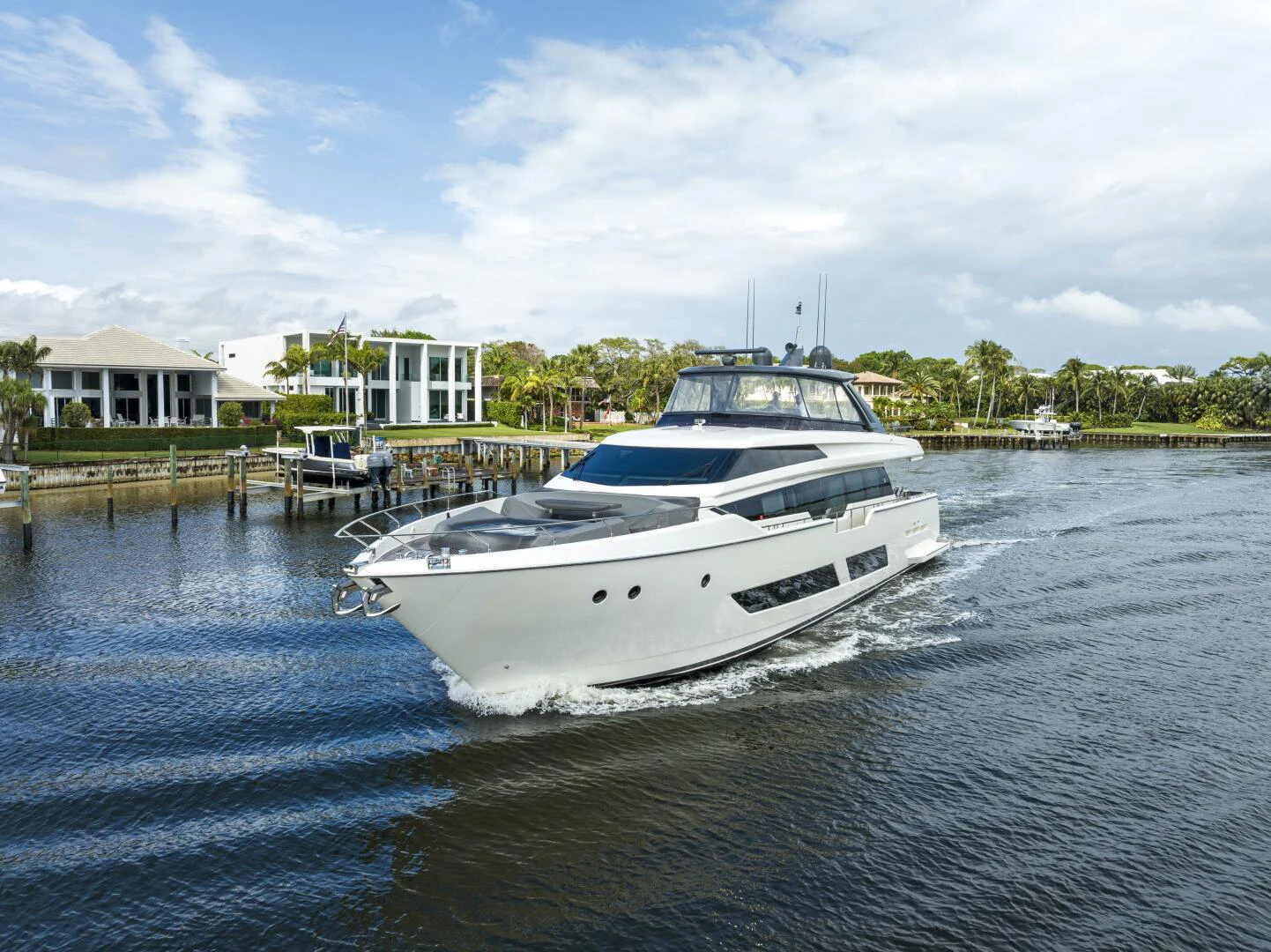 a white boat in a body of water aboard PINCH ME Yacht for Sale