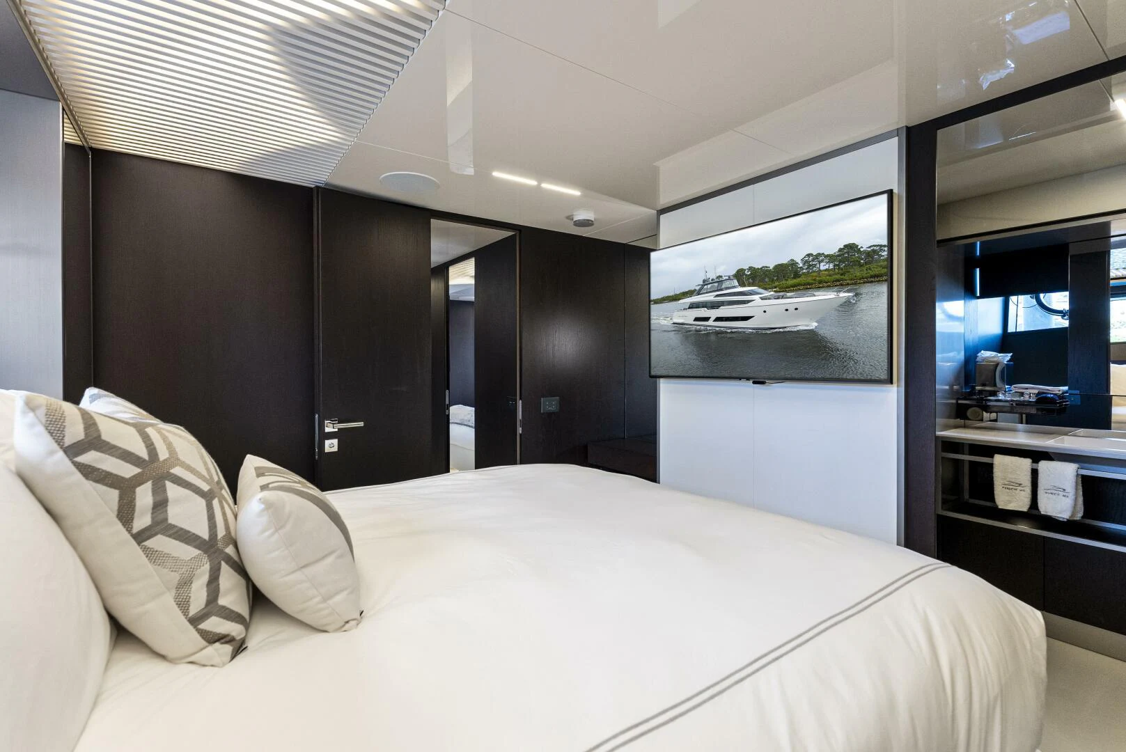 a bed in a room aboard PINCH ME Yacht for Sale