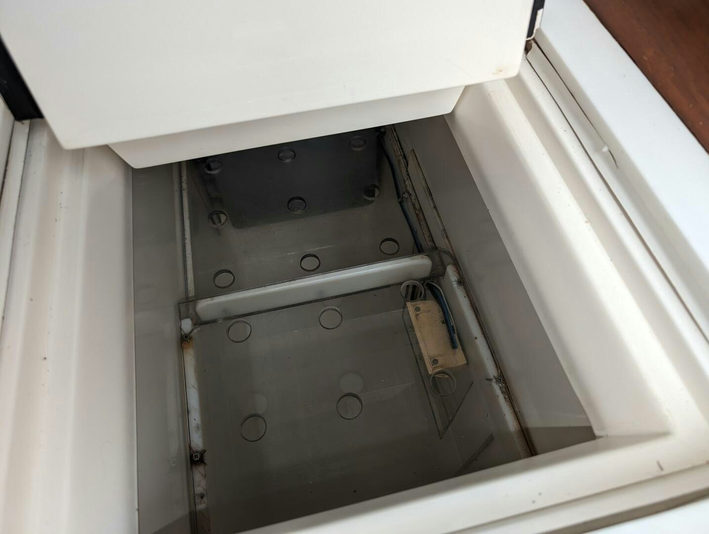 a metal box with a screw aboard MOJO Yacht for Sale