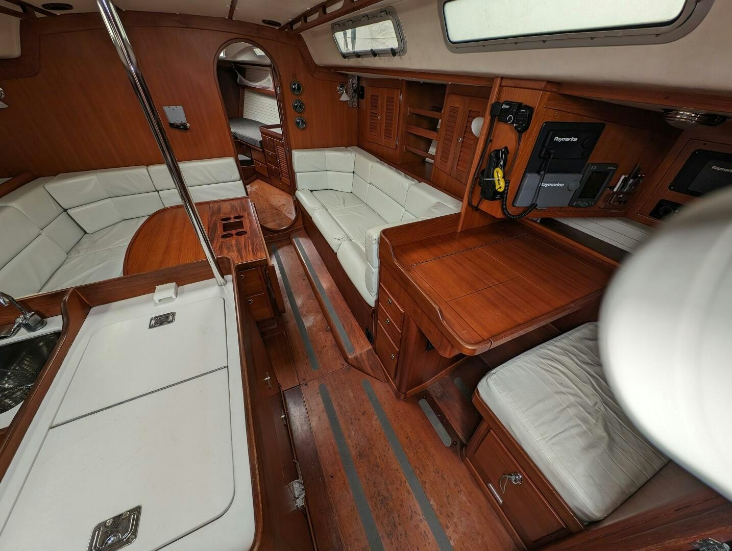 a room with a bed and a desk aboard MOJO Yacht for Sale
