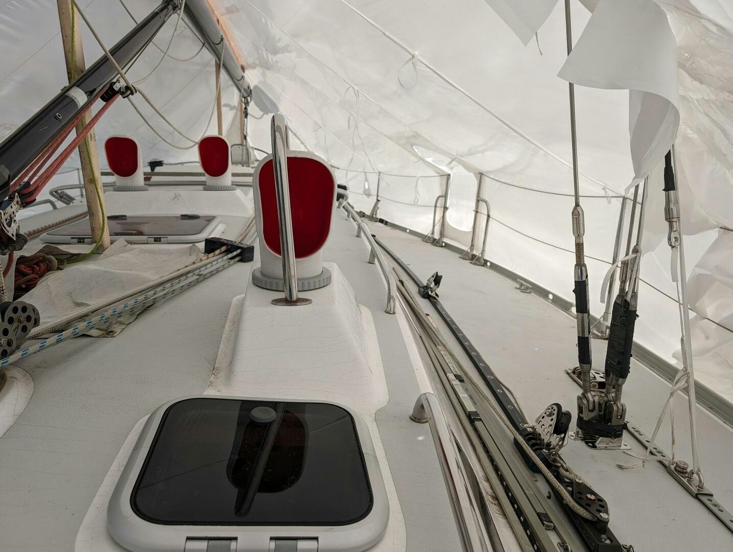 a white car on a white surface aboard MOJO Yacht for Sale