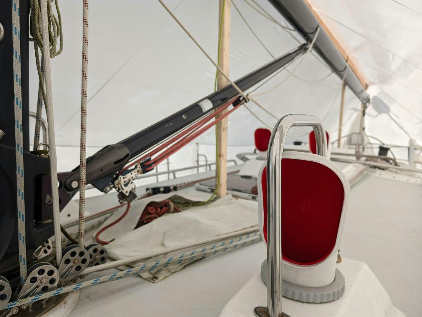 a red and white boat aboard MOJO Yacht for Sale
