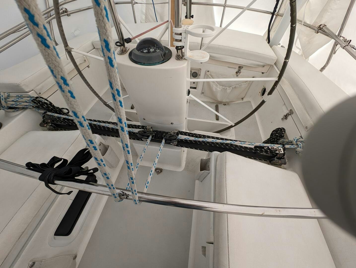 a white boat with ropes aboard MOJO Yacht for Sale