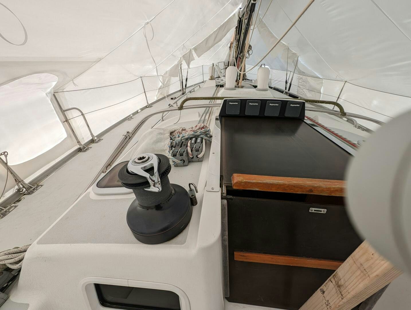 a computer with a pair of headphones on it aboard MOJO Yacht for Sale