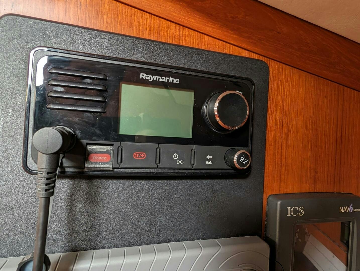 a black radio with a knob aboard MOJO Yacht for Sale