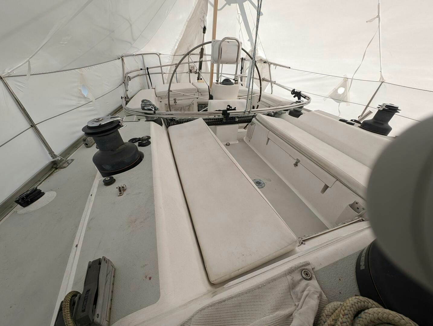 a white boat with a black object on the front aboard MOJO Yacht for Sale