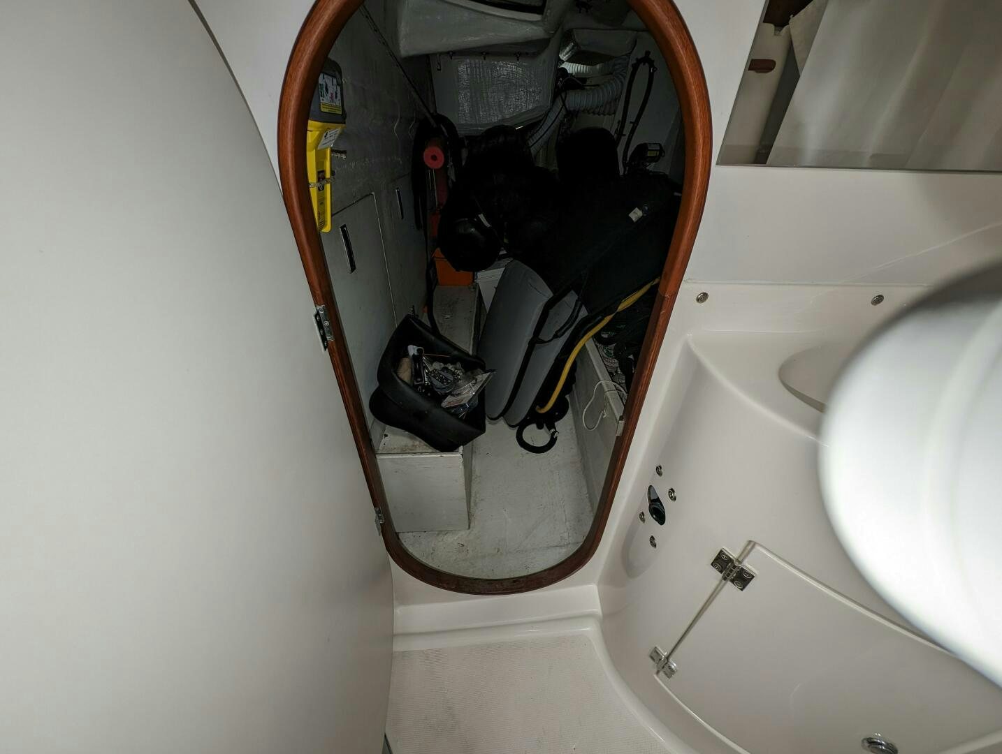 a car with a door open aboard MOJO Yacht for Sale