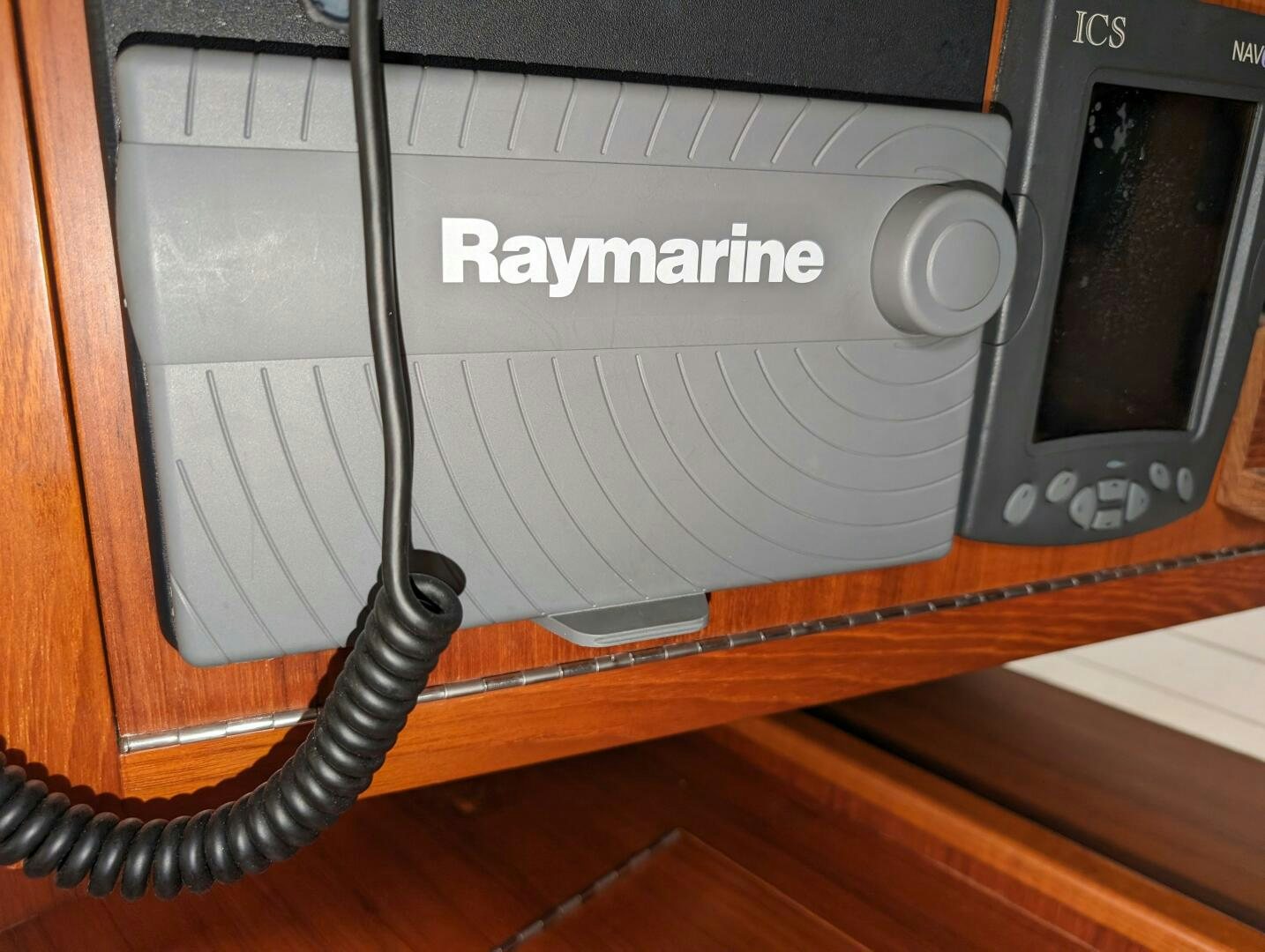 a black and silver video game console aboard MOJO Yacht for Sale