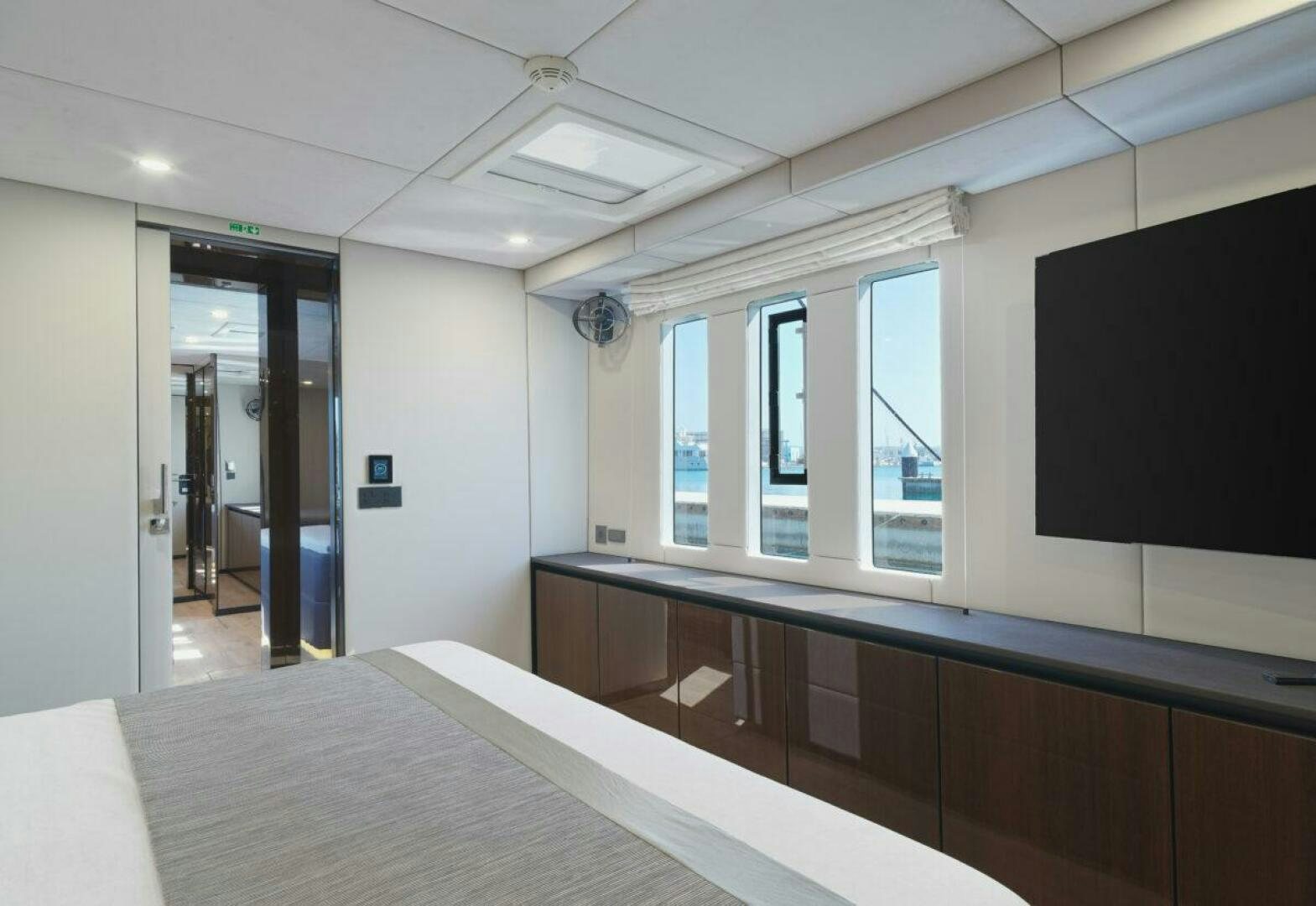 a room with a large screen aboard OV Yacht for Sale