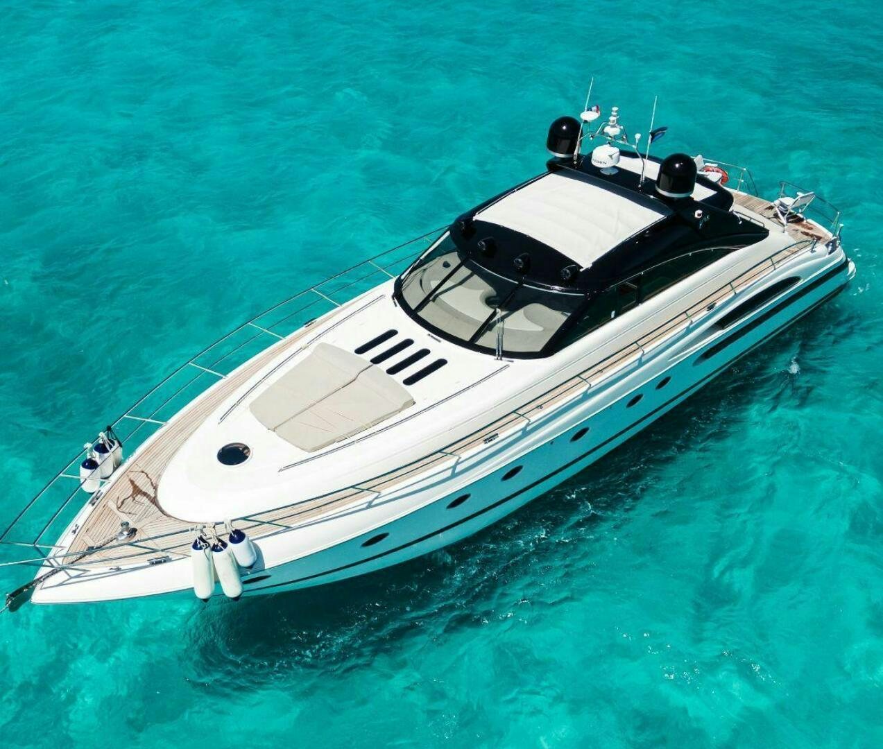 a white boat in the water aboard INCENTIVE Yacht for Sale