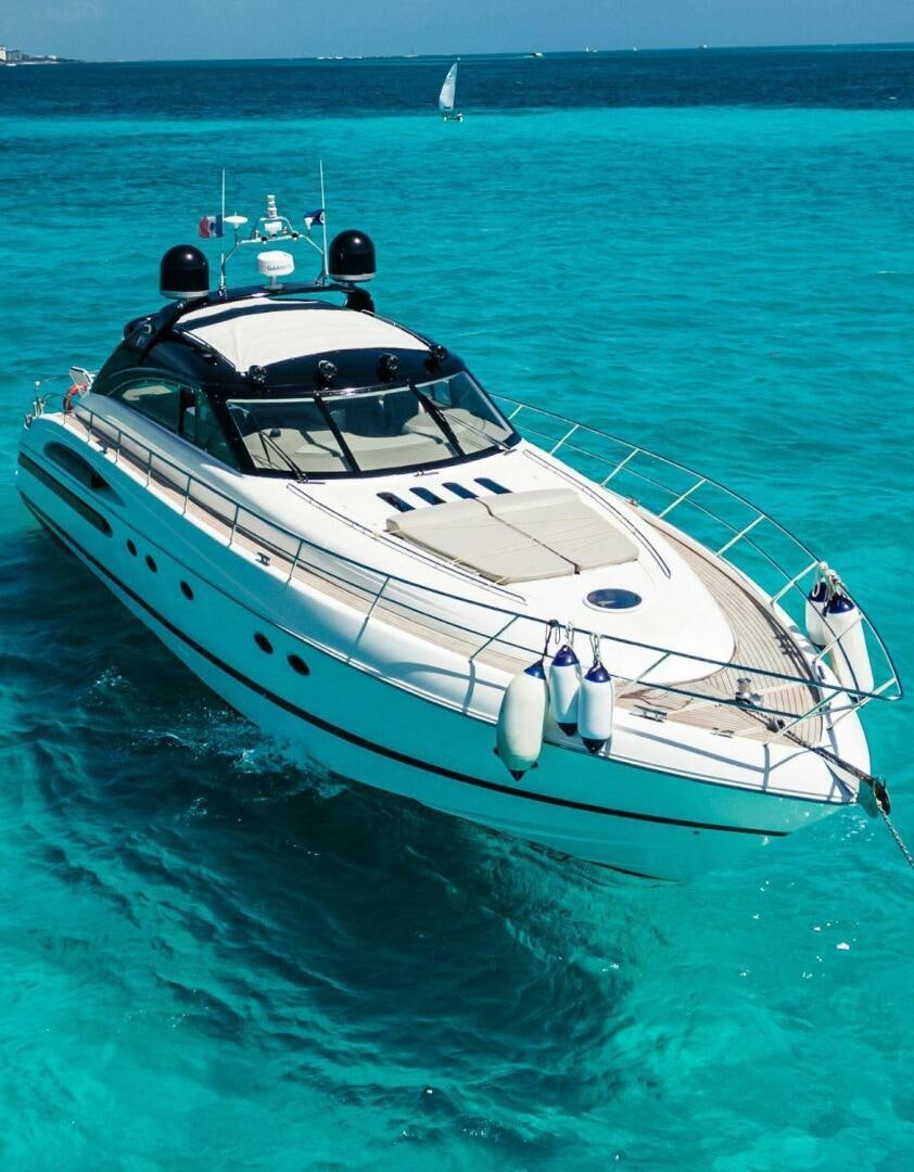 a white boat in the water aboard INCENTIVE Yacht for Sale