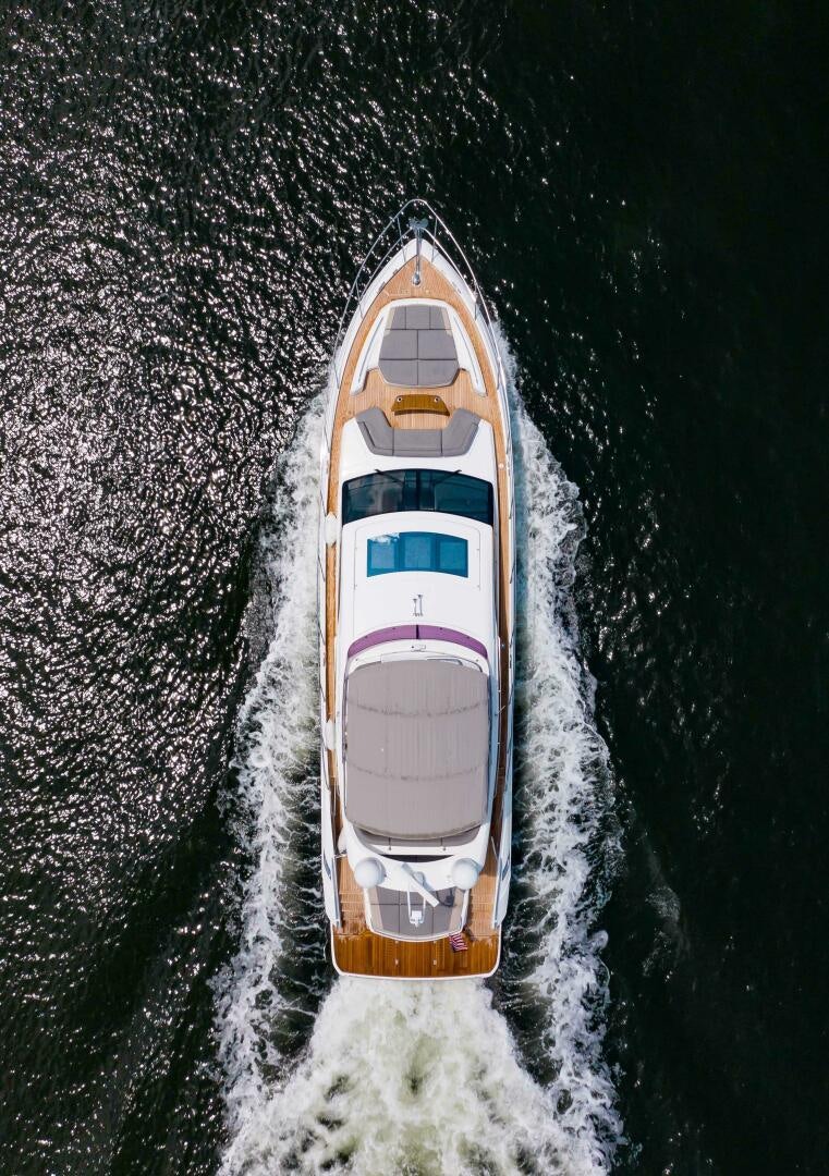 a white and orange boat aboard RIPPLE Yacht for Sale