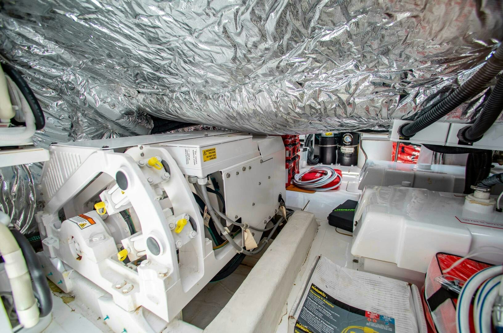 a white machine with a black cap aboard RIPPLE Yacht for Sale