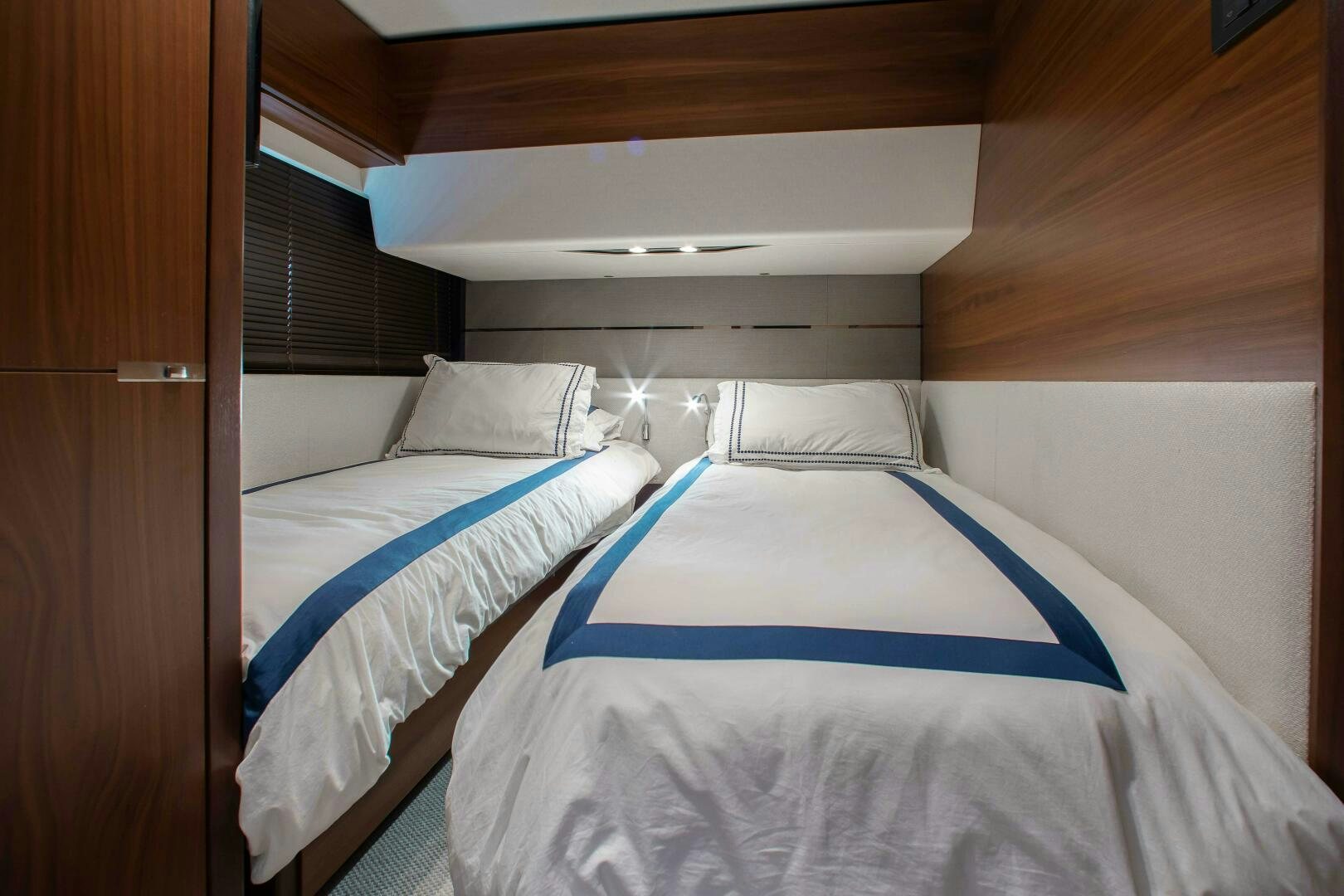 a couple of beds in a room aboard RIPPLE Yacht for Sale
