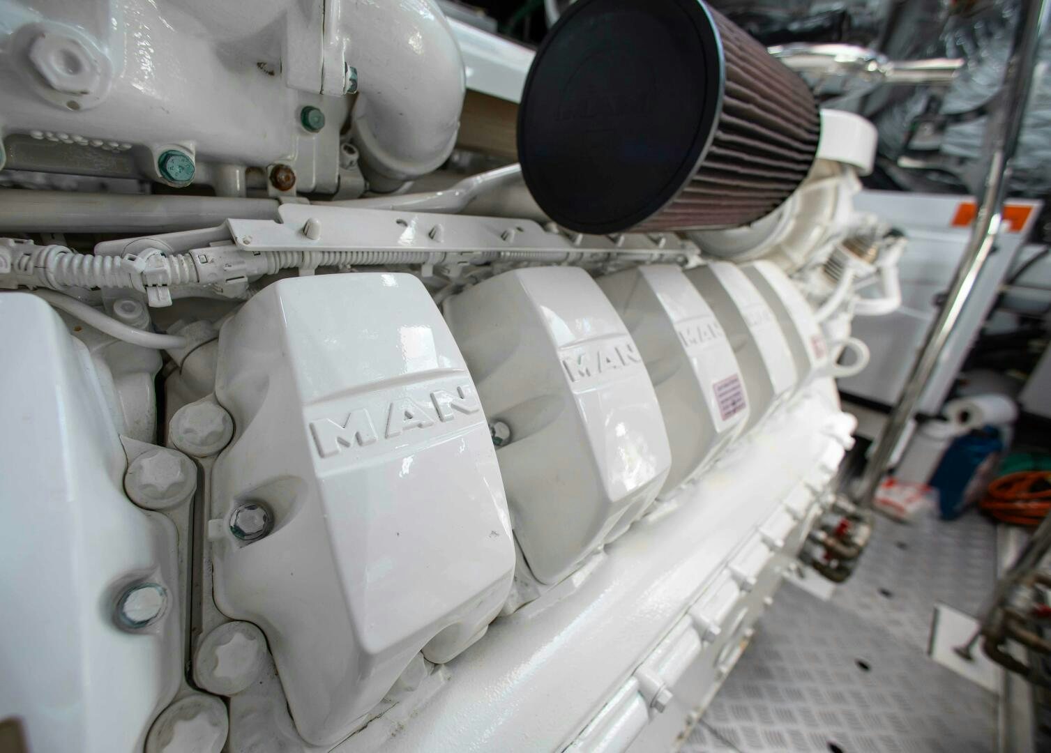 a white machine with a black cap aboard RIPPLE Yacht for Sale