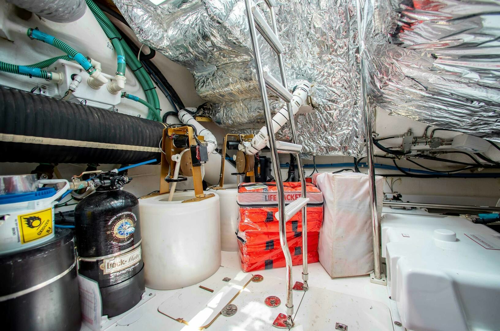 a group of metal buckets with wires and a white bucket aboard RIPPLE Yacht for Sale