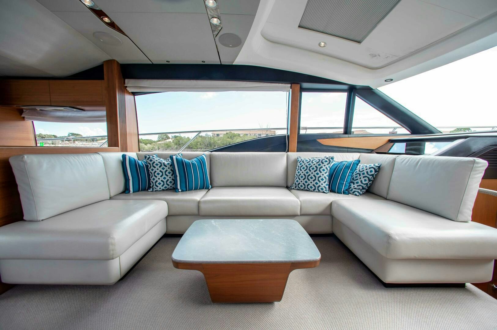 a white couch in a car aboard RIPPLE Yacht for Sale