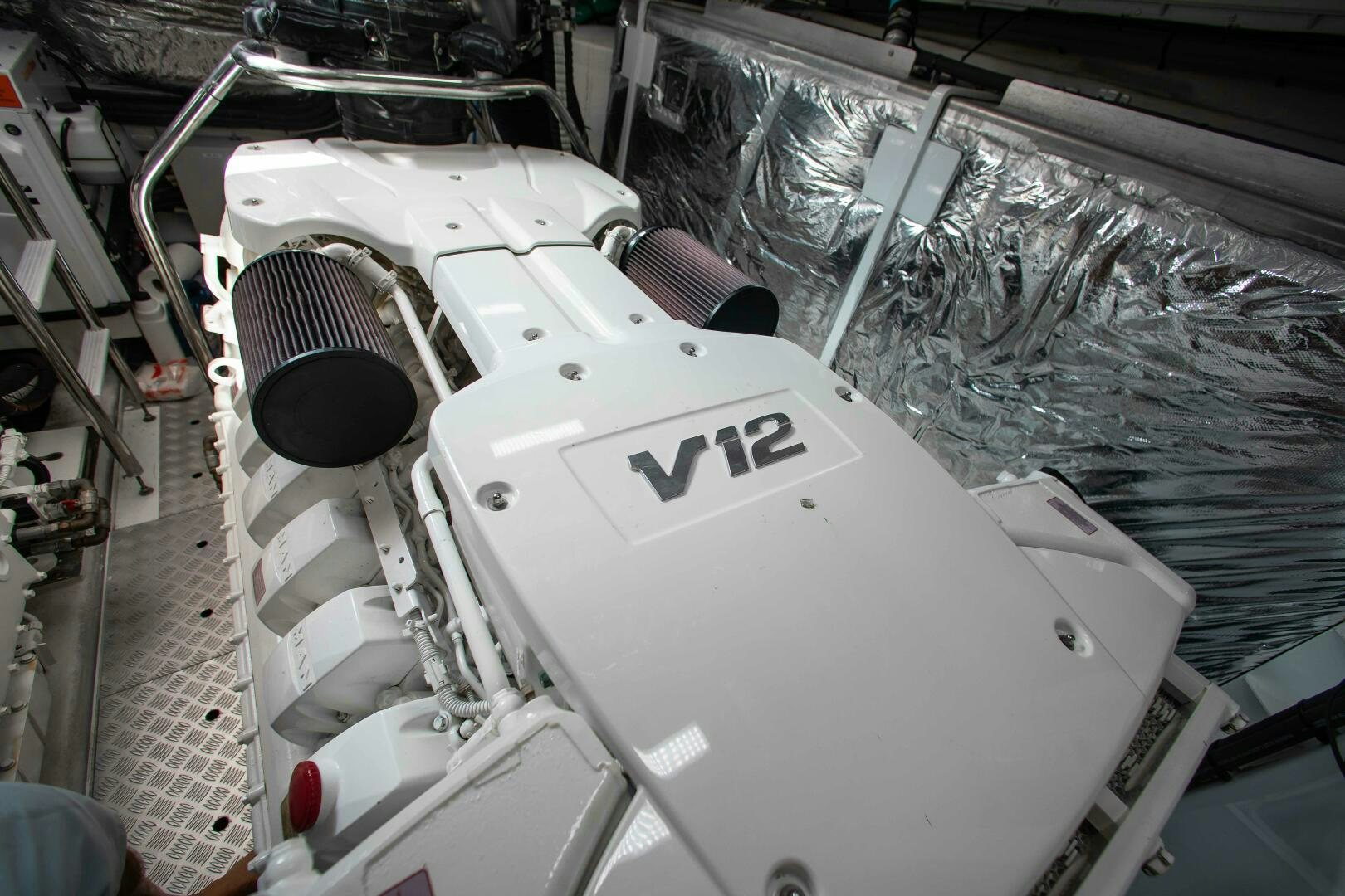 a white boat with a black circle on the front aboard RIPPLE Yacht for Sale