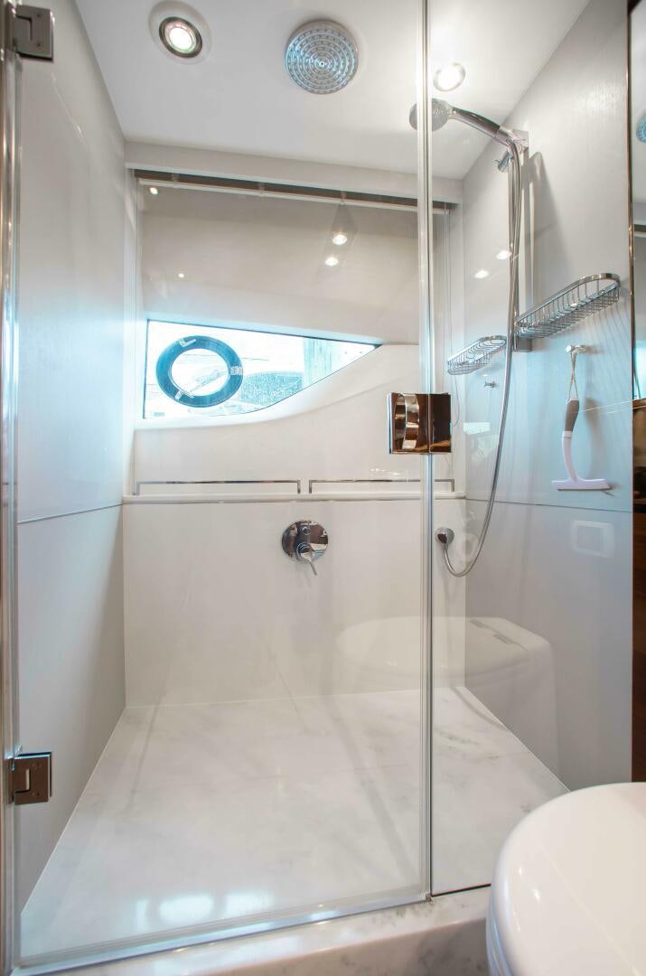 a shower with a glass door aboard RIPPLE Yacht for Sale