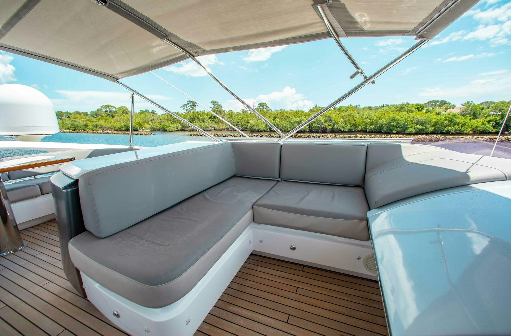 a lounge chair on a deck aboard RIPPLE Yacht for Sale