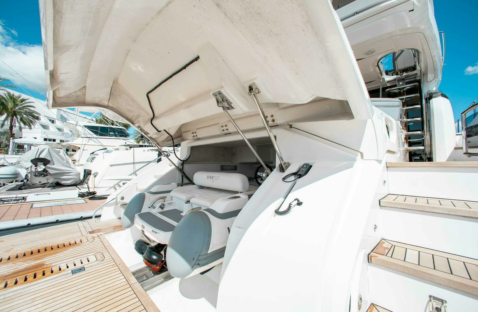 a white boat with a ladder aboard RIPPLE Yacht for Sale
