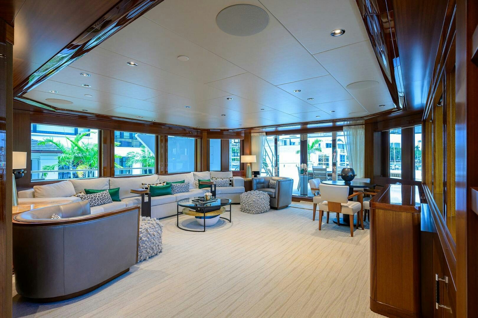 a living room with a large window aboard NEENAH Yacht for Sale