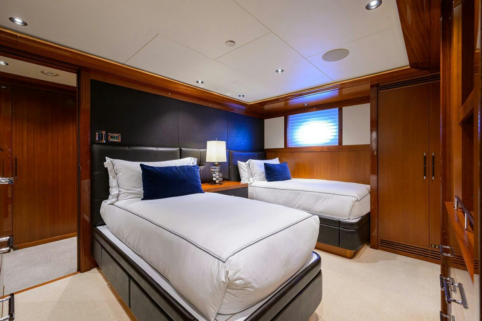 a room with a bed and a desk aboard NEENAH Yacht for Sale
