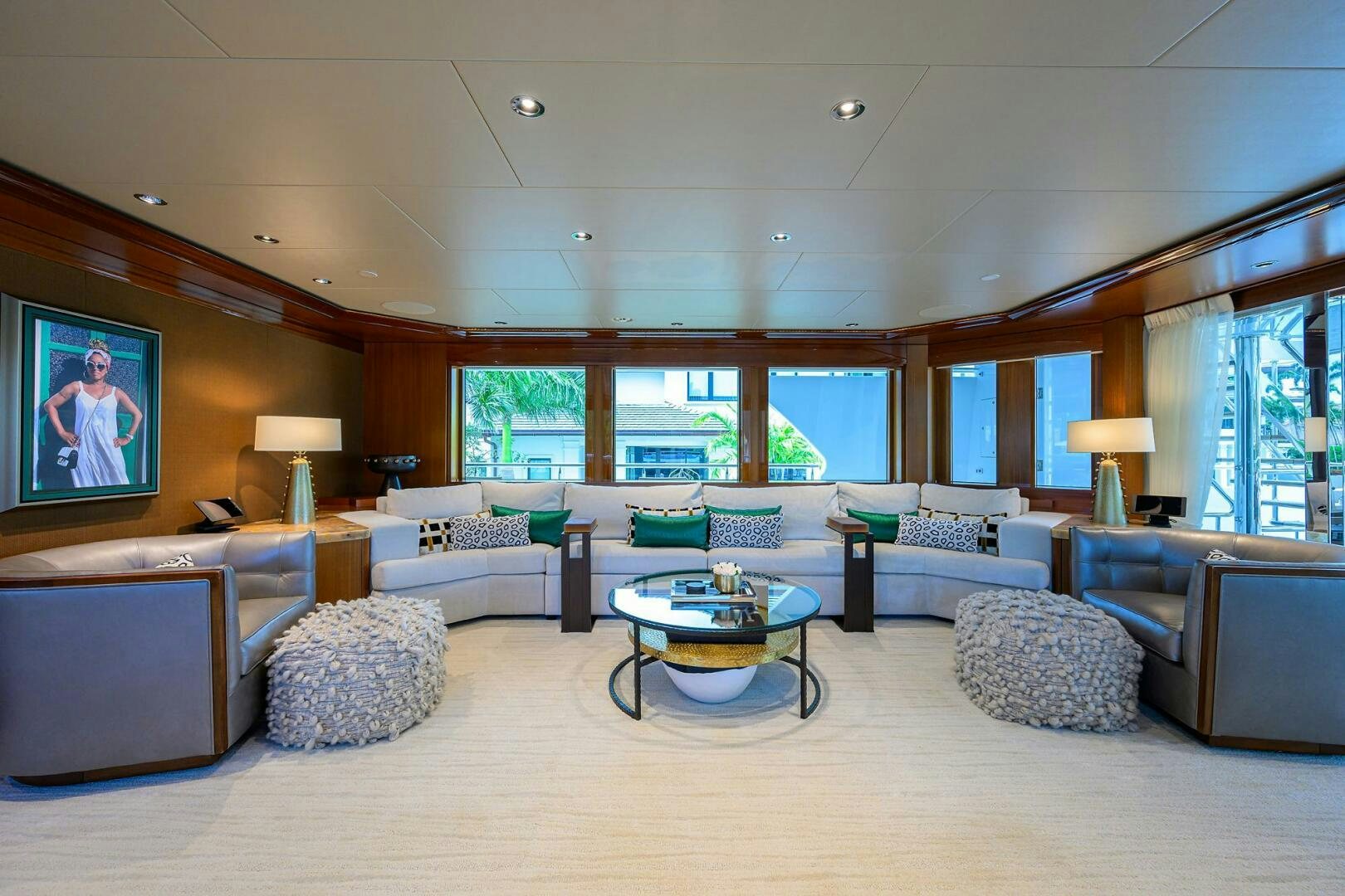 a living room with a large screen aboard NEENAH Yacht for Sale