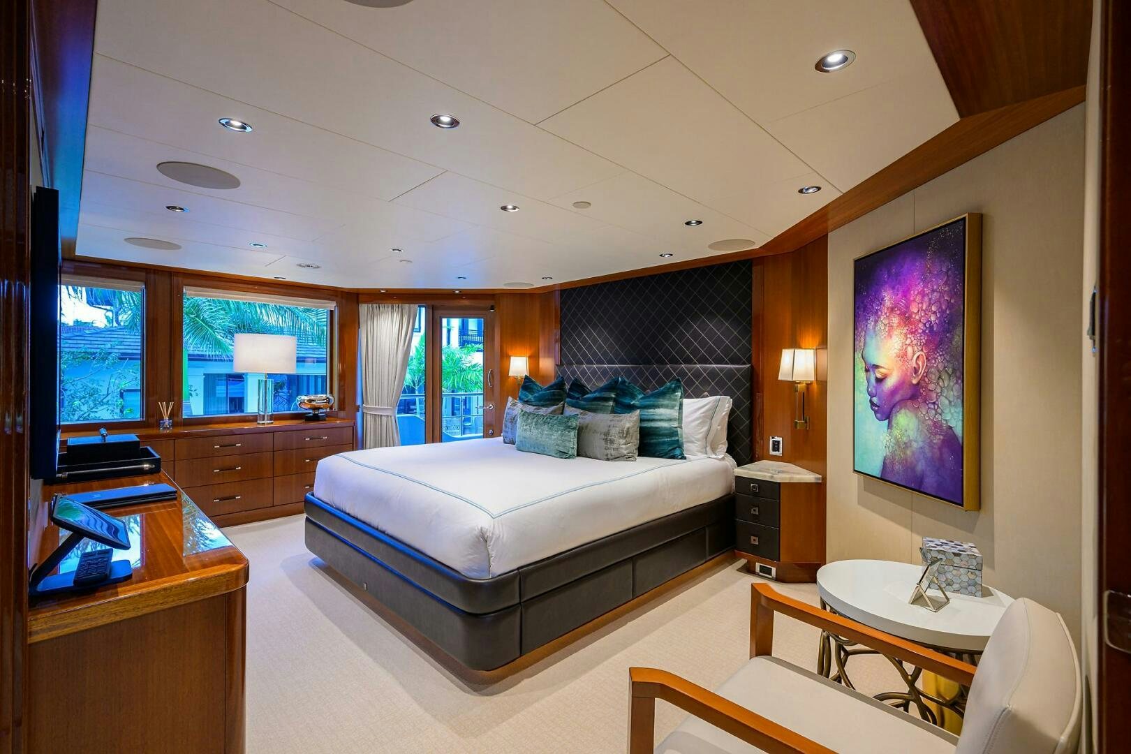 a bedroom with a large bed aboard NEENAH Yacht for Sale