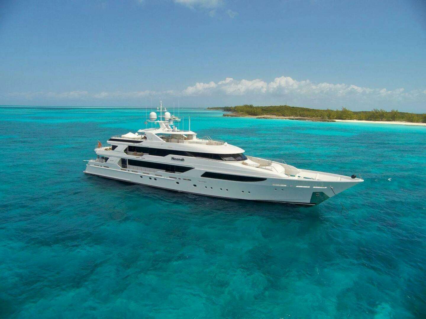 a white yacht in the water aboard NEENAH Yacht for Sale