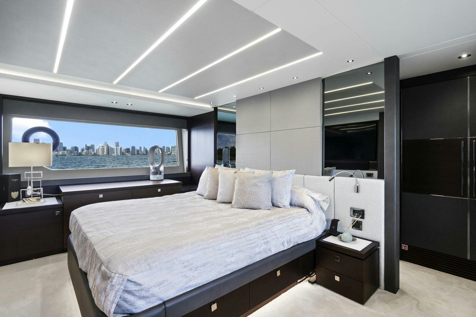 a bedroom with a large bed aboard SEA ONE Yacht for Sale