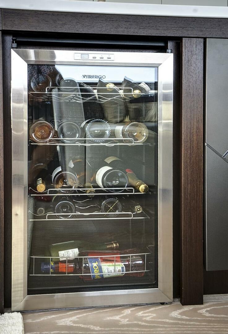 a refrigerator with a glass door aboard SEA ONE Yacht for Sale
