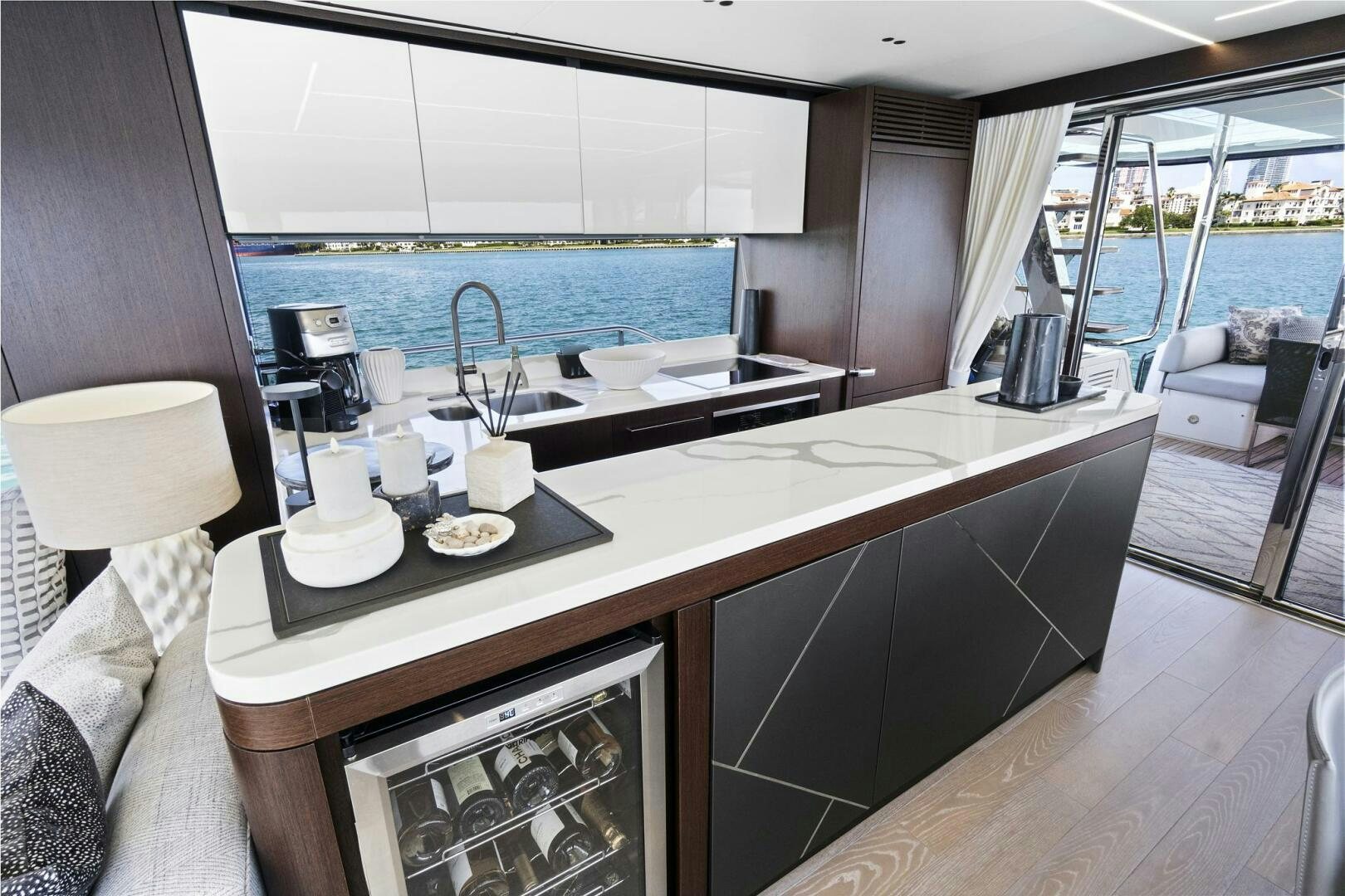 a kitchen with a large island aboard SEA ONE Yacht for Sale