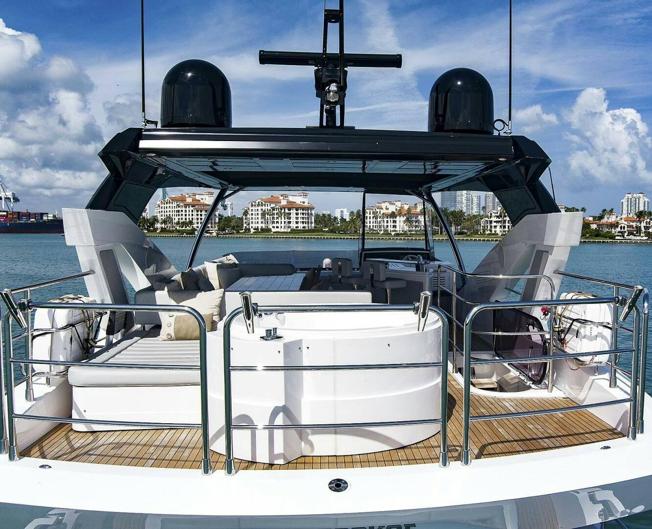 a boat with a large black object on it aboard SEA ONE Yacht for Sale