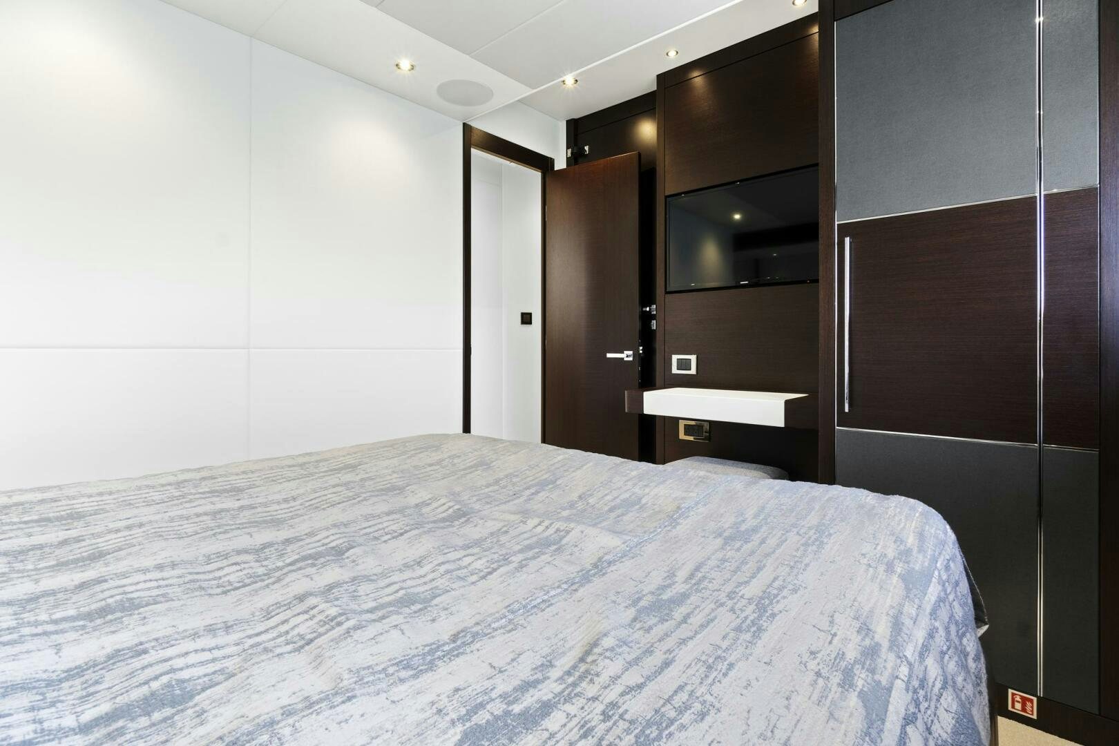 a large bed in a room aboard SEA ONE Yacht for Sale