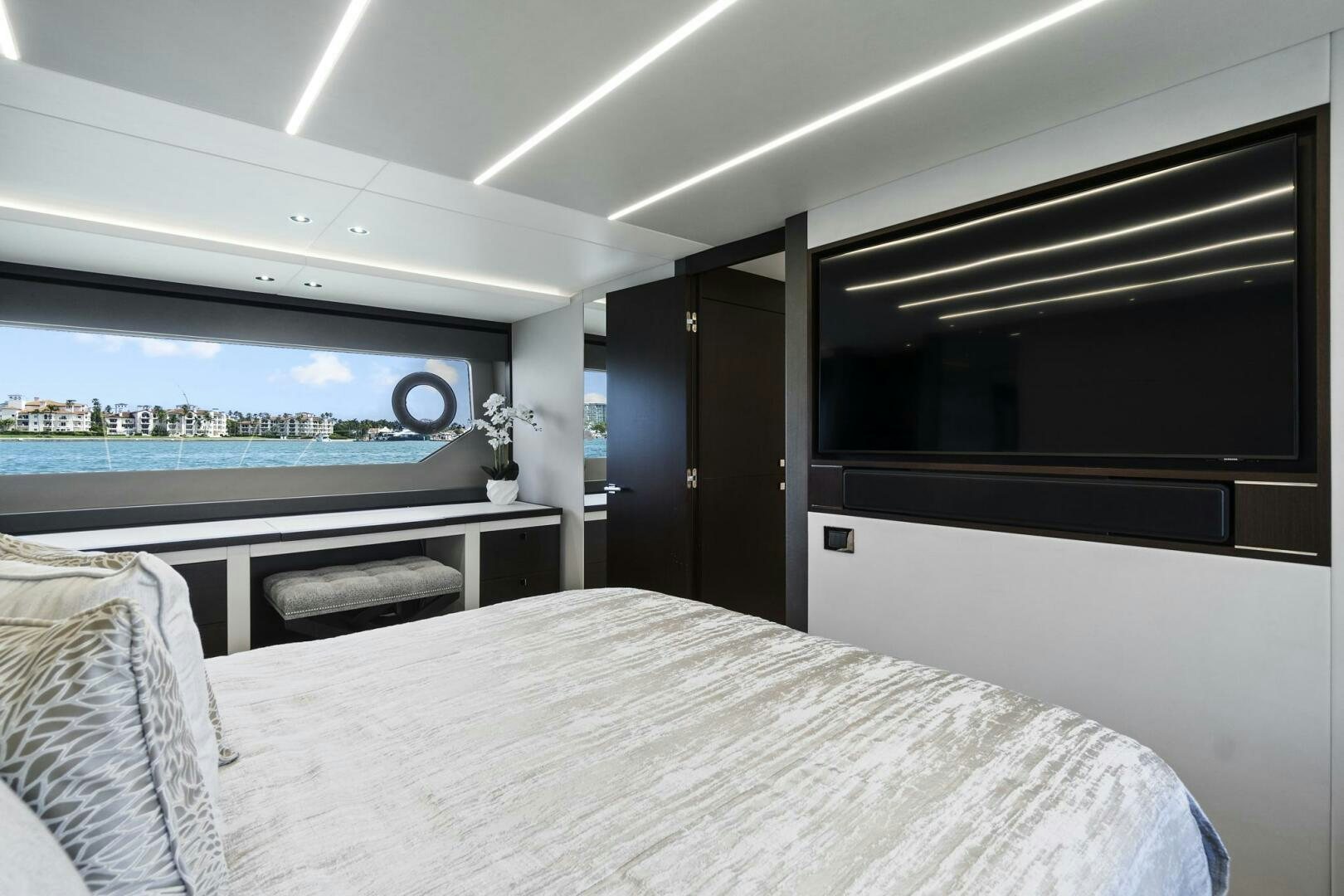 a bedroom with a large bed aboard SEA ONE Yacht for Sale