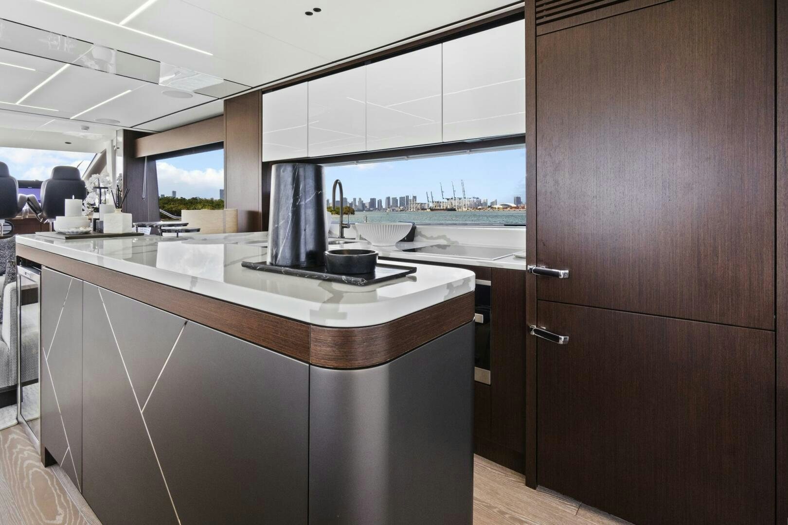 a kitchen with a large window aboard SEA ONE Yacht for Sale