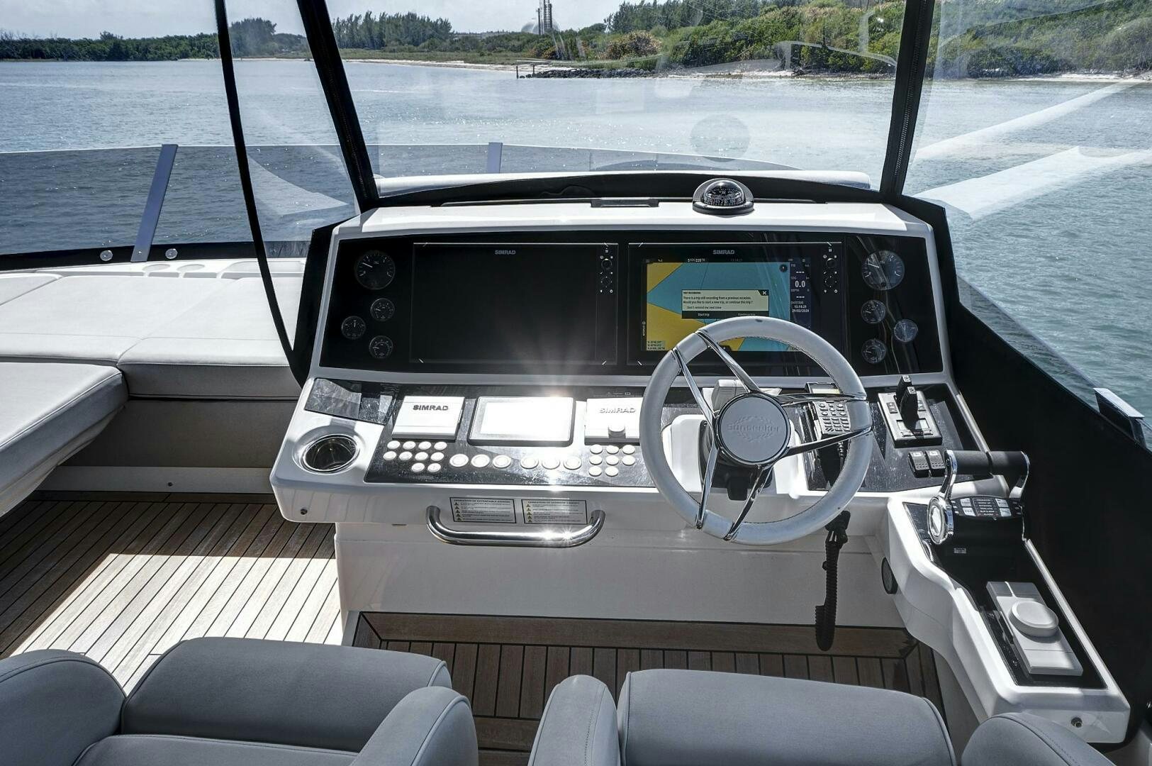 inside of a car aboard SEA ONE Yacht for Sale