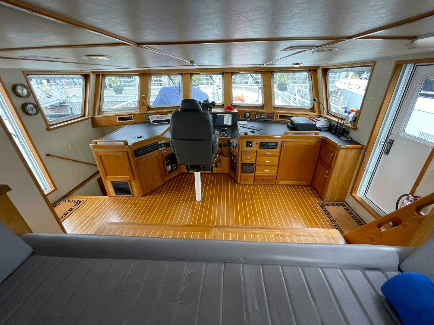 a room with a desk and a chair aboard TRAVELLER II Yacht for Sale