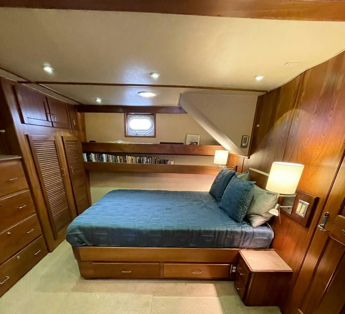 a bed in a room aboard TRAVELLER II Yacht for Sale