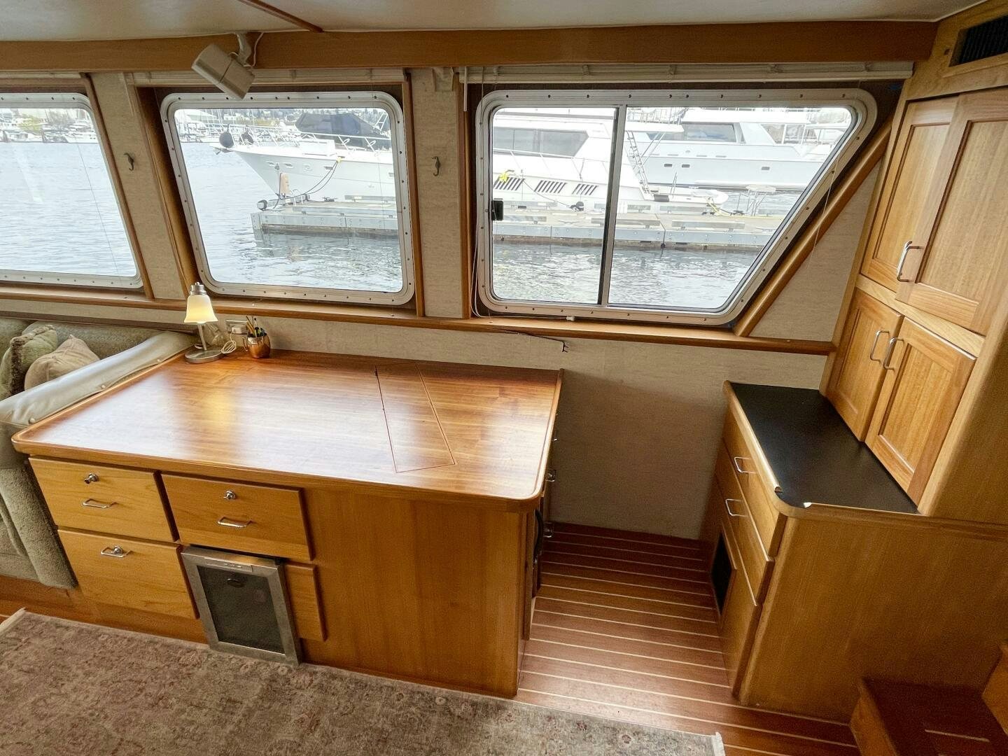 a room with a desk and a laptop aboard TRAVELLER II Yacht for Sale