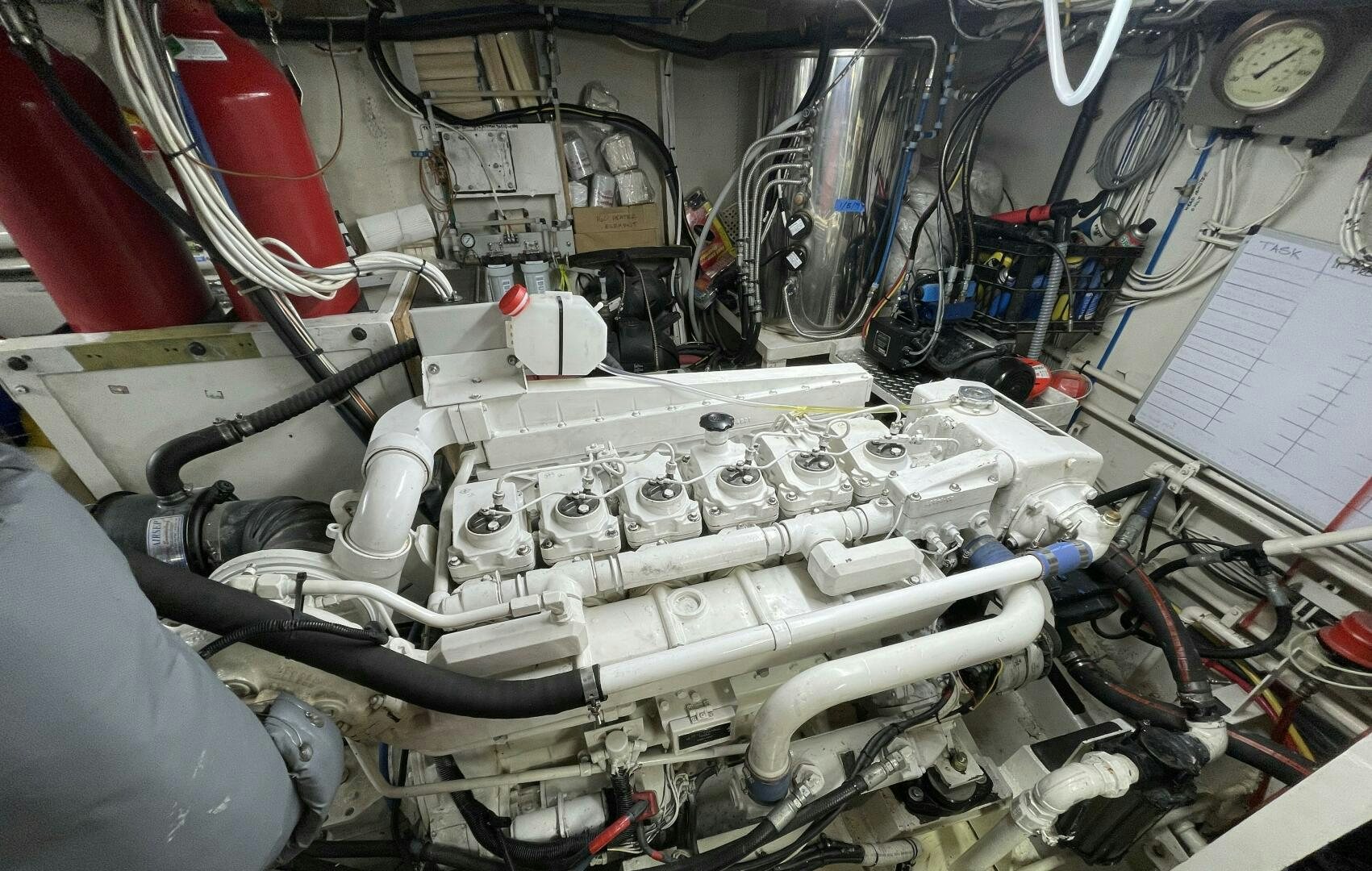 a white machine with wires aboard TRAVELLER II Yacht for Sale