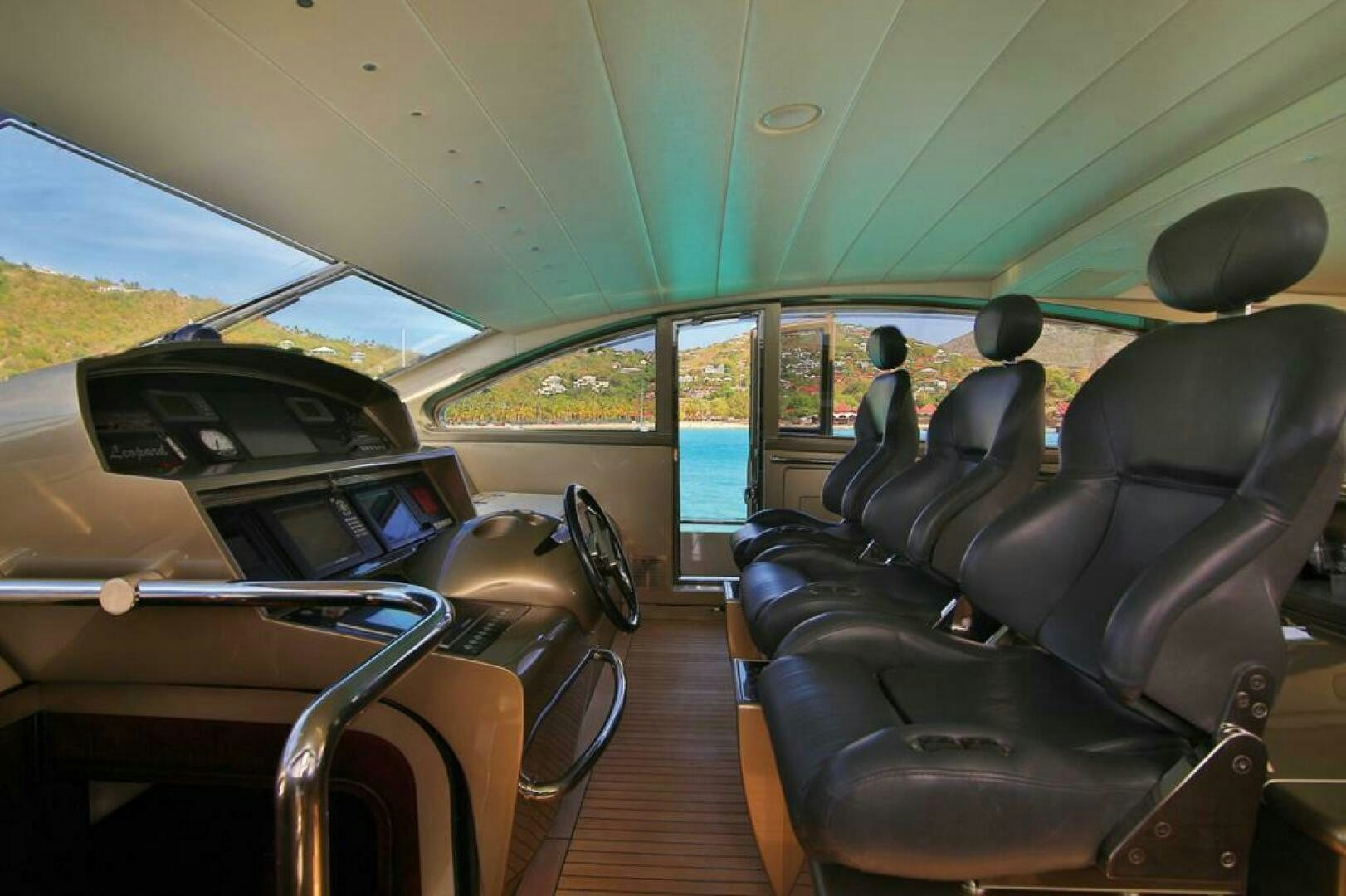 inside of a vehicle with a person sitting in the front seat aboard TENDER TO Yacht for Sale