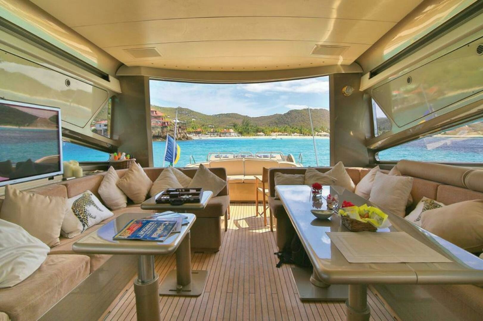 a living room with a large ocean aboard TENDER TO Yacht for Sale