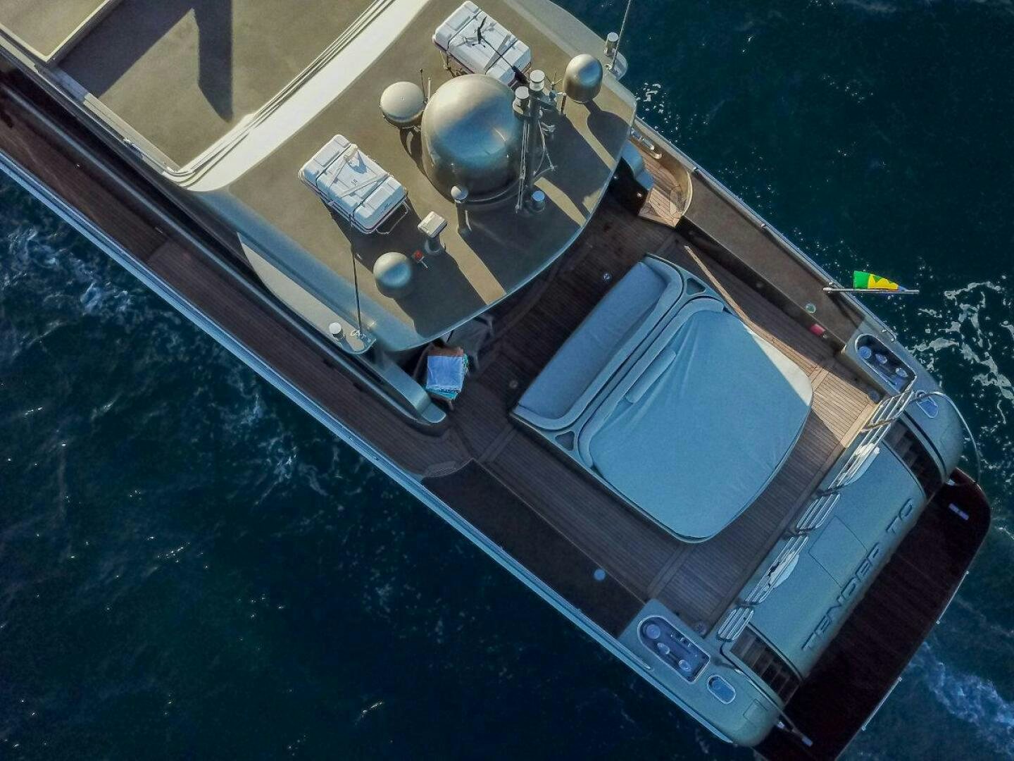 a large blue object with a round object in it aboard TENDER TO Yacht for Sale