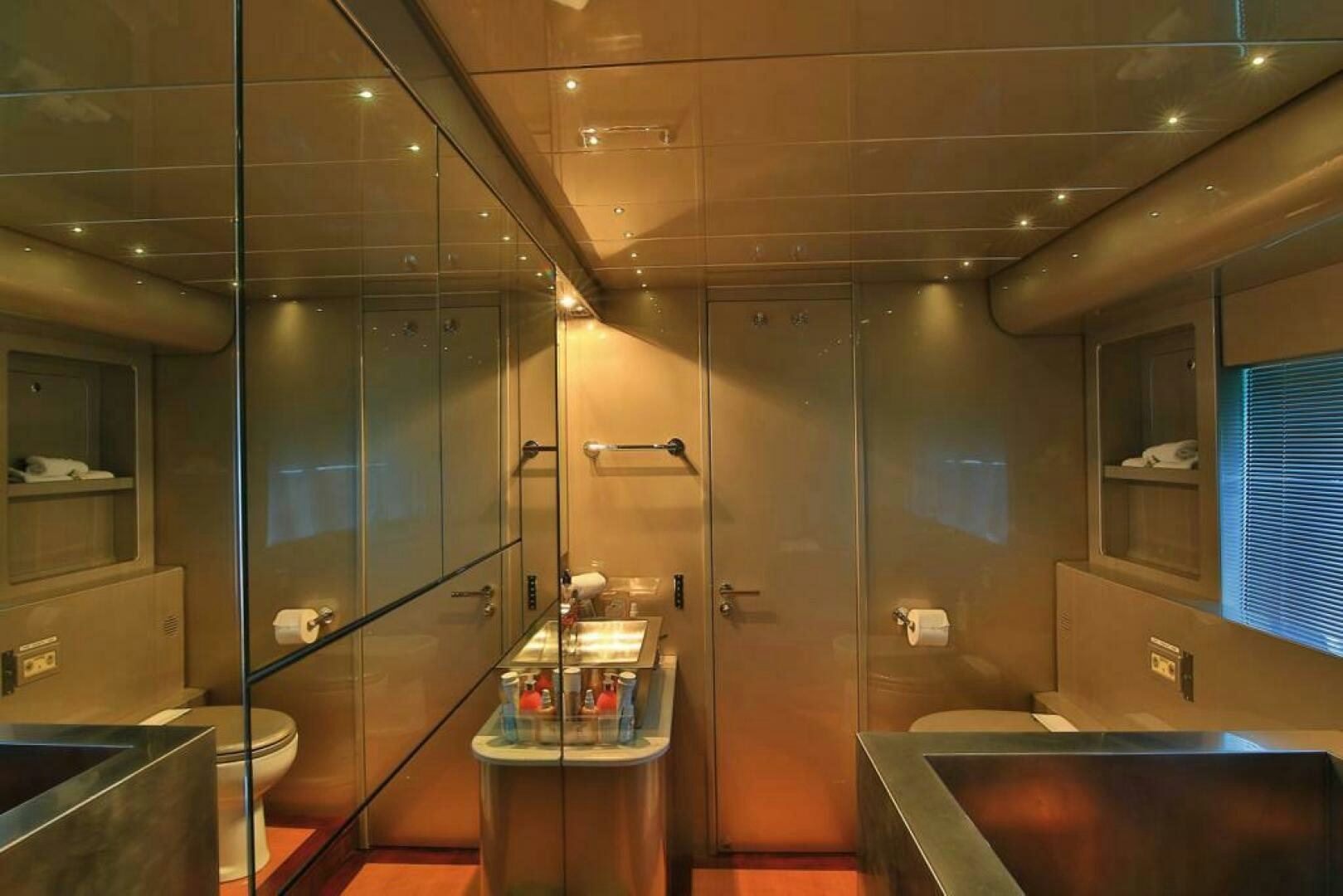 a bathroom with a glass shower aboard TENDER TO Yacht for Sale